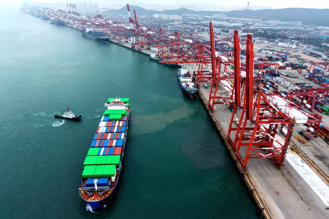Beijing Takes Defiant Stance After Trump Announces New 100 Percent Tariffs