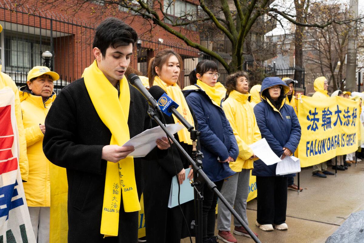 Toronto Falun Gong practitioner Bogdan Diordiev speaks outside the Chinese Consulate in Toronto on April 25, 2026, as Falun Gong practitioners gather to commemorate the 27th anniversary of their fellow practitioners’ April 25, 1999, appeal in Beijing calling for freedom of belief. (Evan Ning/The Epoch Times)