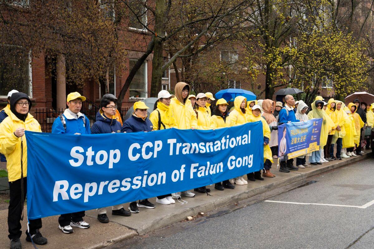 Falun Gong practitioners gather in front of the Chinese Consulate in Toronto on April 25, 2026, to commemorate the 27th anniversary of their fellow practitioners' April 25, 1999, appeal in Beijing calling for freedom of belief. (Evan Ning/The Epoch Times)