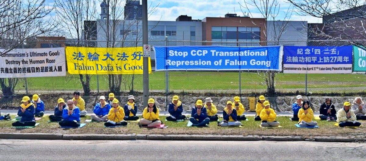 Ottawa practitioners of Falun Gong hold an event in front of the Chinese Embassy in Ottawa on April 22, 2025, to commemorate the 27th anniversary of their fellow adherents’ April 25, 1999, peaceful appeal in Beijing calling for the freedom of belief. Falun Gong practitioners are also calling for an end to the persecution of their spiritual belief. (The Epoch Times)