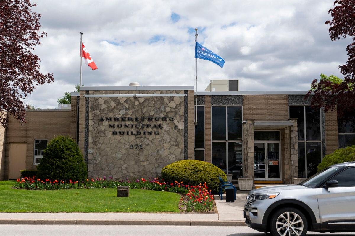 The Town of Amherstburg raised the Falun Dafa Day flag to commemorate Falun Dafa's 34th anniversary at a flag-raising ceremony on April 30, 2026. (Evan Ning/The Epoch Times)