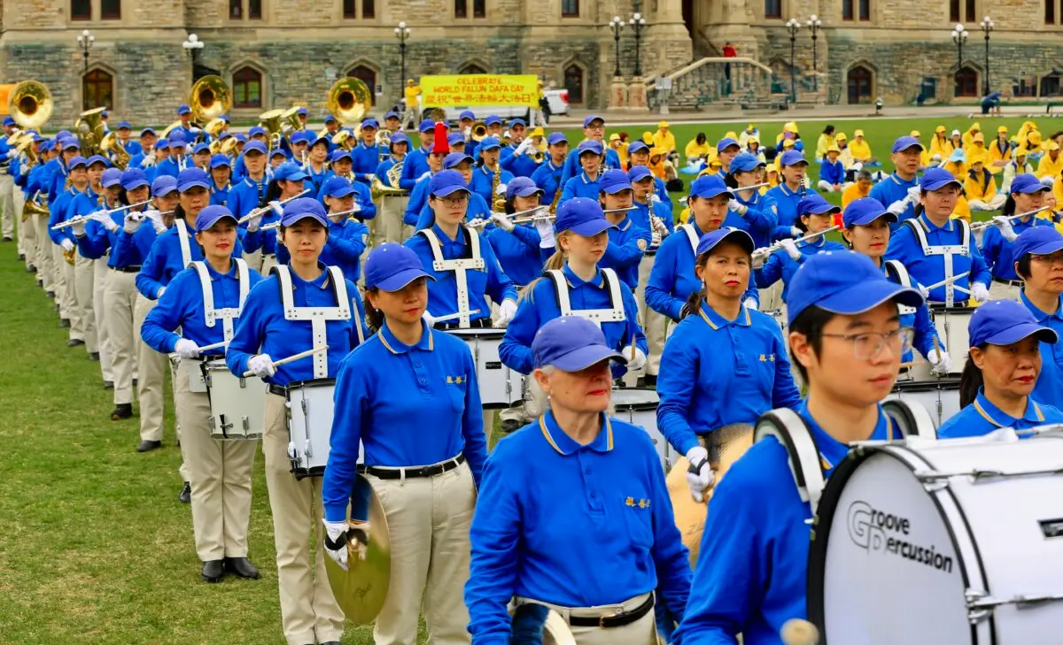 The Tian Guo Marching Band performs as part of activities to celebrate World Falun Dafa Day on Parliament Hill in Ottawa on May 5, 2026. (Jonathan Ren/The Epoch Times)