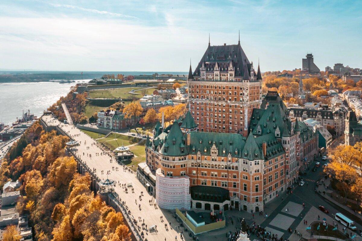 Aerial view showcasing Fairmont Le Château Frontenac, a historical hotel in Quebec City.(Shutterstock/ywei61)