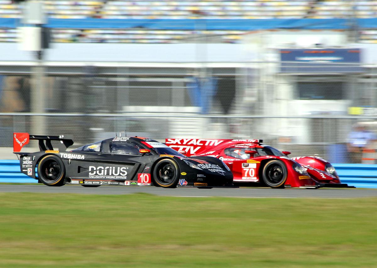 The Rolex 24 will feature the face-off between cutting-edge P2s like this brand-new #70 Mazda SkyActiv diesel, and upgraded Daytona Prototypes like the 2013 Rolex champion #10 Wayne Taylor Racing Dallara-Chevrolet. (Chris Jasurek/Epoch Times)