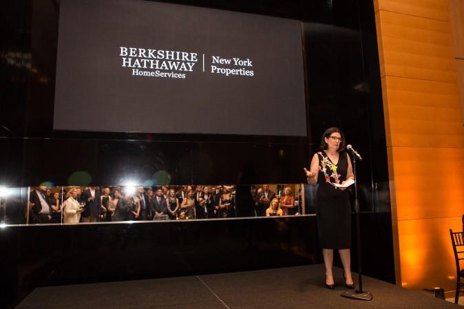 Ellie Johnson, president of the Berkshire Hathaway HomeServices New York Properties, speaks to guests during the celebration of their grand opening location in New York. (Benjamin Chasteen/The Epoch Times)