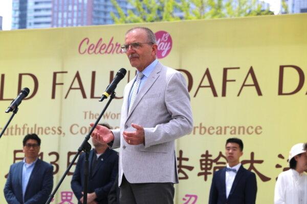 Former MP Wladyslaw Lizon speaks during a rally outside of the Toronto City Hall where hundreds of Falun Gong adherents gathered to celebrate the 32nd World Falun Dafa Day on May 11, 2024. (Andrew Chen/The Epoch Times)