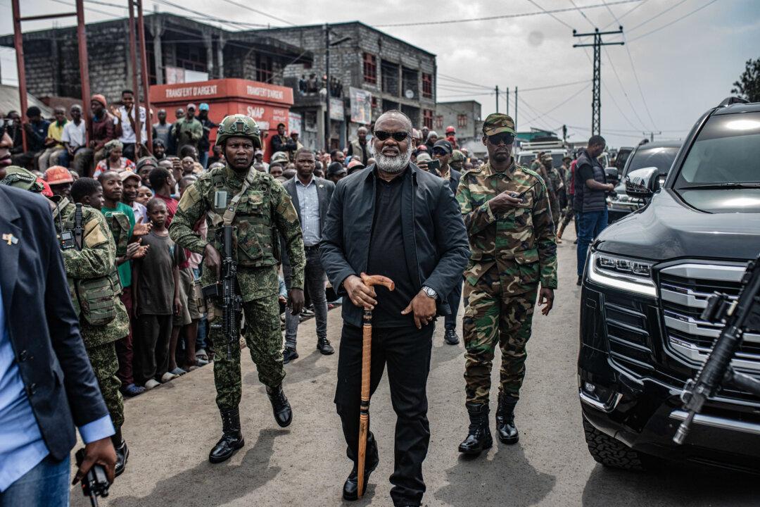 GOMA, DEMOCRATIC REPUBLIC OF CONGO - FEBRUARY 6: Corneille Nangaa, M23 North Kivu provincial leadership marked one year of M23's control of Goma with a review of ongoing construction work and a visit to the Stade de l'Unite on February 6, 2026 in Goma, Democratic Republic of Congo. One year on from the unexpected capture of Goma by the Rwandan-backed M23 rebel group, the parallel administration is hosting a public gathering for locals to attend an address by the M23-appointed governor of North Kivu, Joseph Bahati Musanga Erasto. Since the capital of the eastern DRC region fell on January 27, 2025, hundreds of thousands of people have been displaced and many financial institutions remain closed. (Photo by Daniel Buuma/Getty Images)