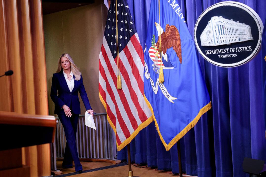 WASHINGTON, DC - FEBRUARY 06: U.S. Attorney General Pam Bondi arrives to deliver remarks on an arrest connected to the 2012 U.S. Embassy attack in Benghazi, at the Department of Justice on February 6, 2026 in Washington, DC. Justice Department officials announced that the FBI has arrested Zubayr al-Bakoush, a suspect in 2012 attack on the U.S. Embassy in Benghazi, Libya. (Photo by Kevin Dietsch/Getty Images)