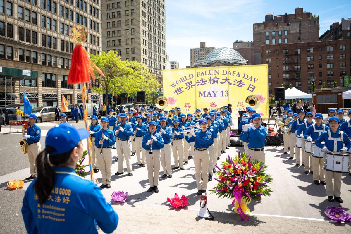 Falun Gong practitioners celebrate World Falun Dafa Day in New York City on May 7, 2023. (Samira Bouaou/The Epoch Times)
