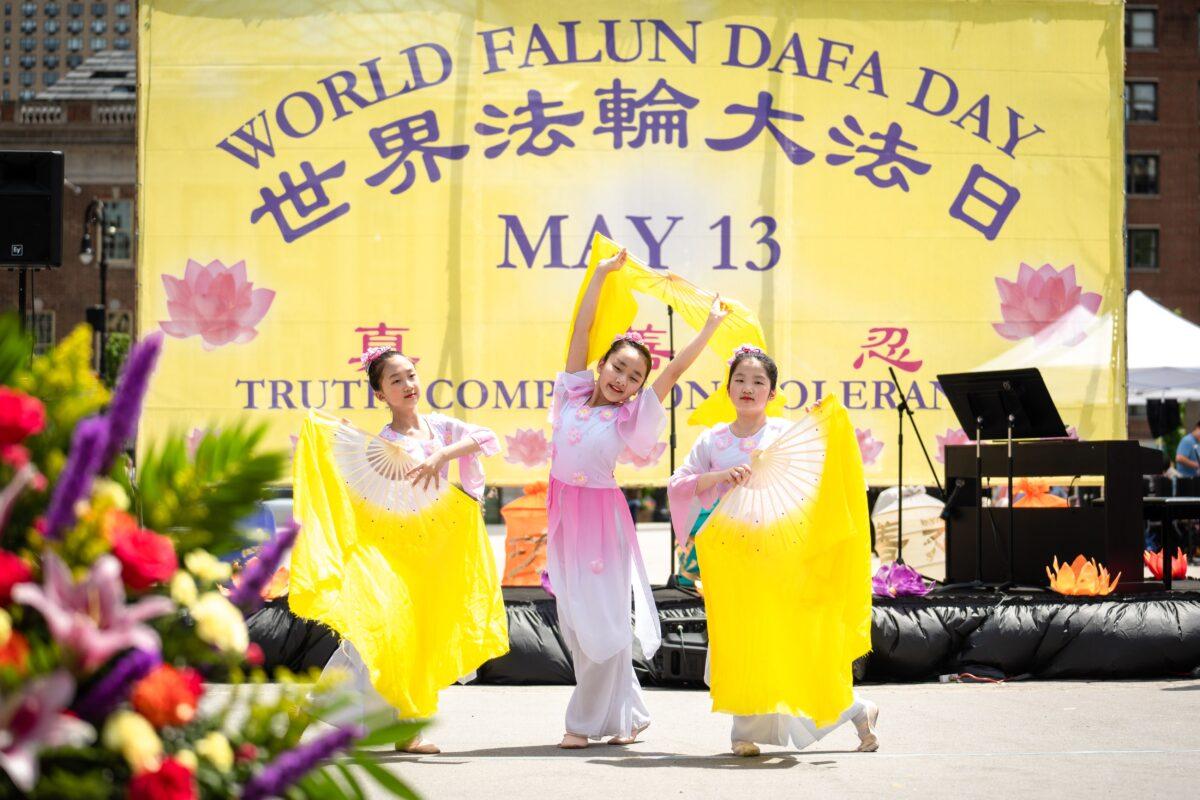 Falun Gong practitioners celebrate World Falun Dafa Day in New York City on May 7, 2023.(Samira Bouaou/The Epoch Times)