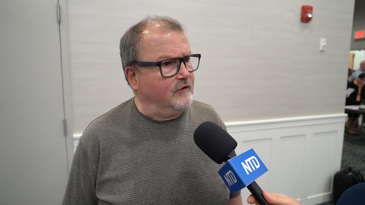 Mr. Michael Senisch, a whistle paramedic, and the candidate for New Castle Council, attends the documentary screening of “Medical Genocide” at Goldey-Beacom College (GBC) in Delaware on April 10, 2024. (Andrew Li/The Epoch Times)