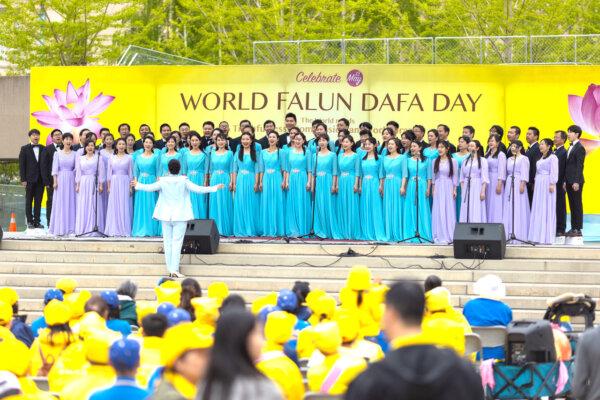 Falun Gong adherents perform outside Toronto City Hall on May 11, 2024, celebrating the 32nd World Falun Dafa Day. (Alex Gurevich/The Epoch Times)