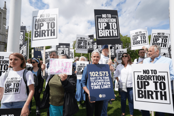 Pro-life groups demonstrate outside the Houses of Parliament in Westminster, London, on May 15, 2024. (Lucy North/PA Wire)