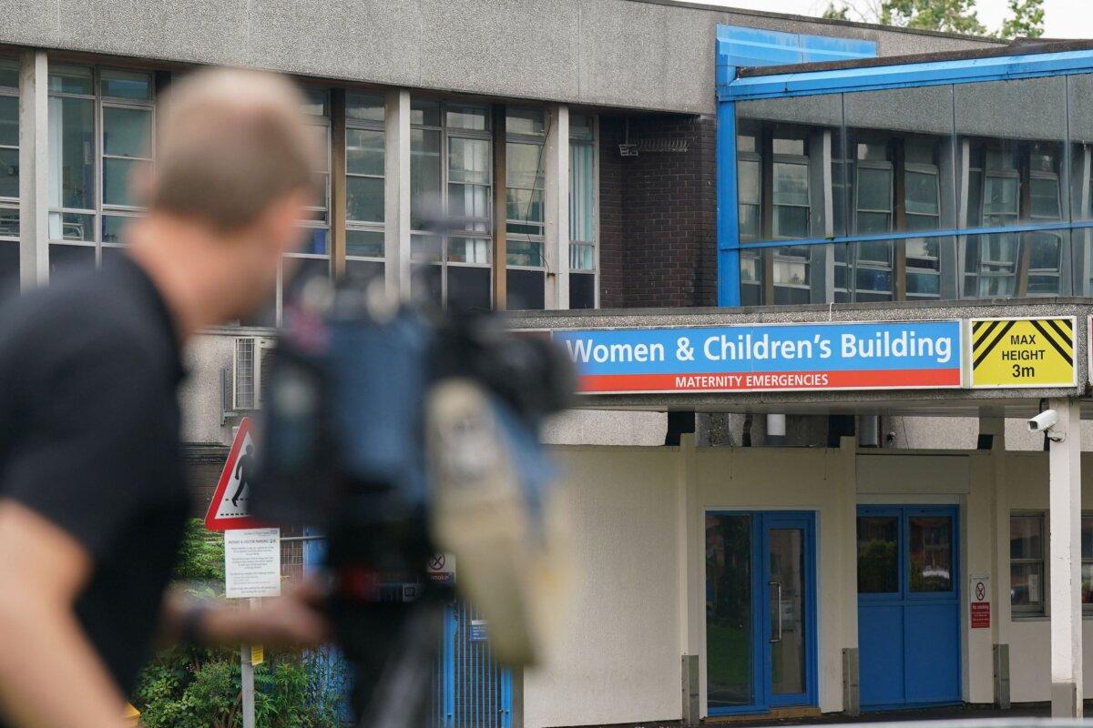 Media gather outside of Countess of Chester Hospital, as they wait for Medical Director Nigel Scawn to deliver a statement to the media, in Chester, England, on Aug. 18, 2023. (Jacob King/POOL/AFP via Getty Images)
