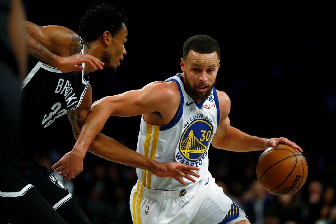 Stephen Curry Scores 29 Points, Warriors Overcome Slow Start to Beat the Nets 109–98