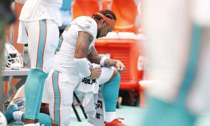 NFL Player Albert Wilson Continues Kneeling Protest During National Anthem