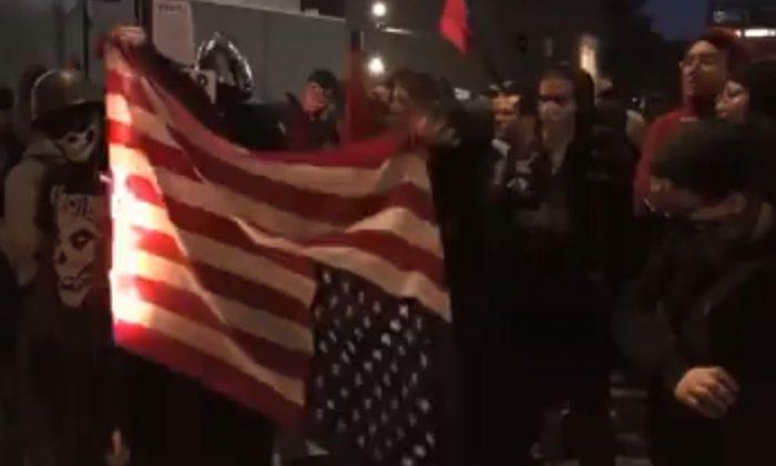 Video: Antifa Burns American Flag in Portland Brawl; Someone Saves It From Flames