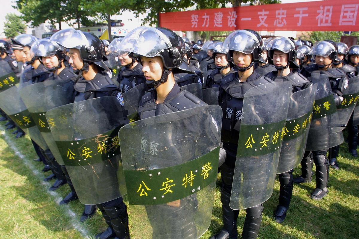 Dozens Injured as Police and Farmers Clash in China