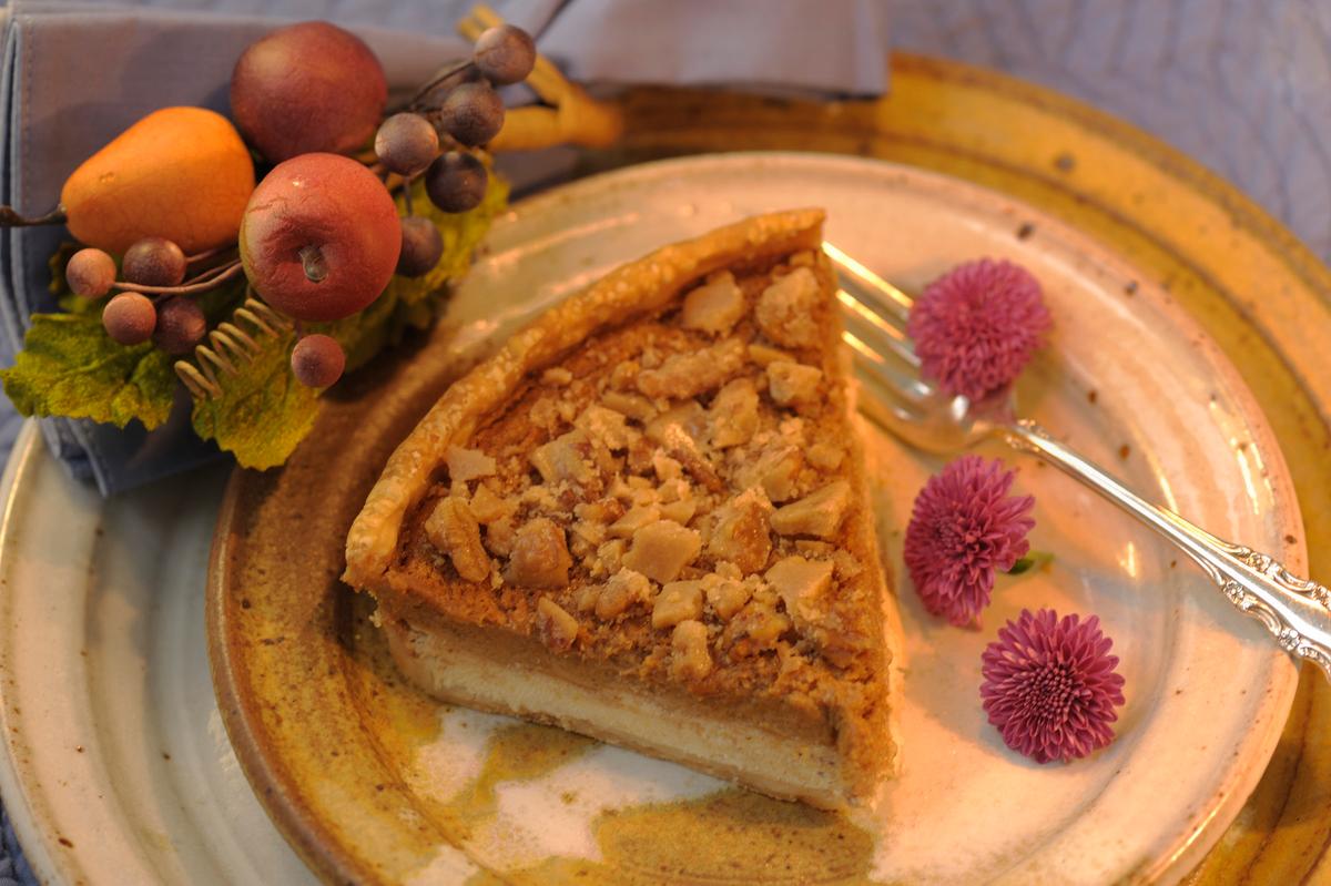 Decadent praline pumpkin pie with cream cheese filling 