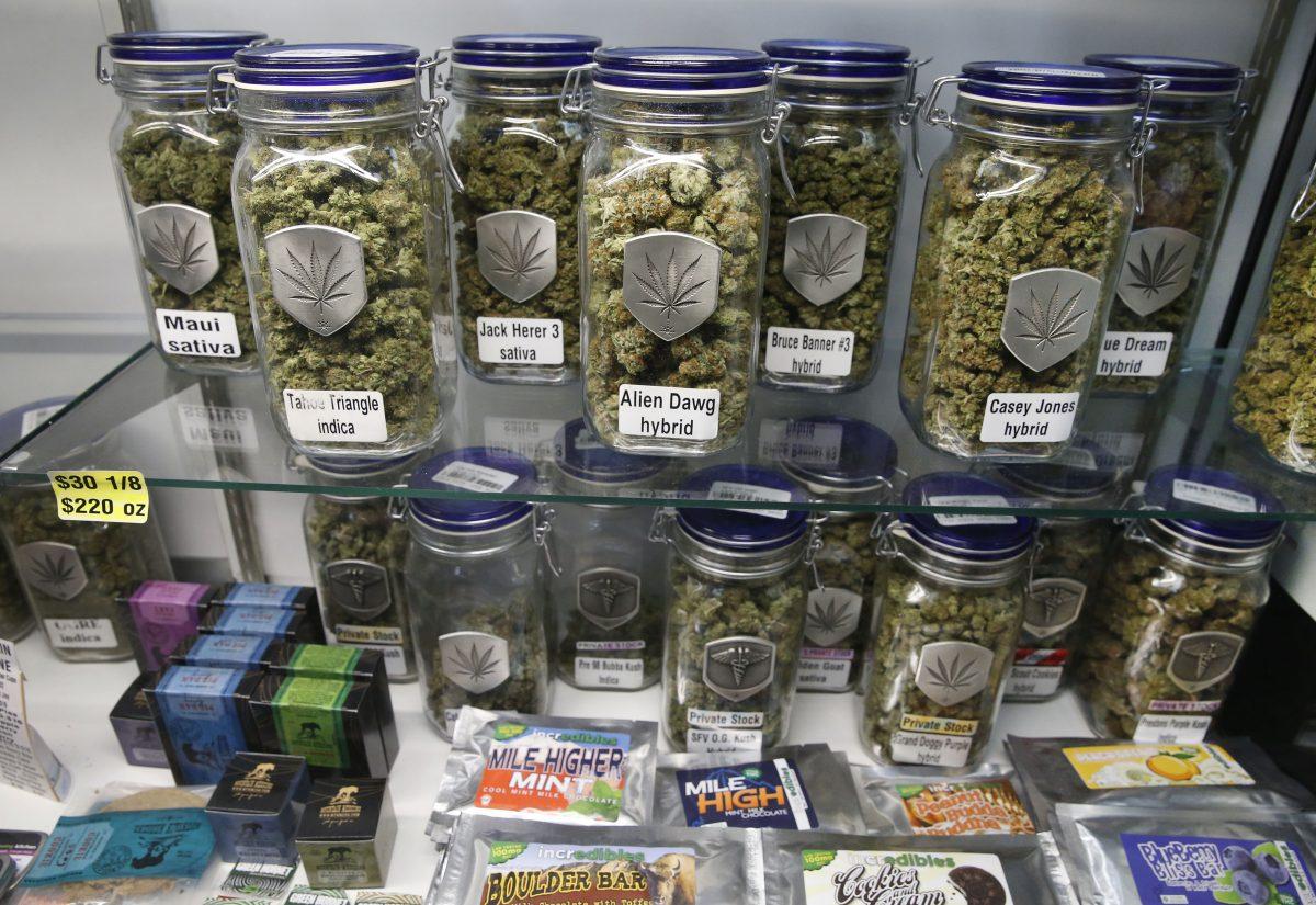 Marijuana and cannabis-infused products are displayed for sale at Medicine Man marijuana dispensary, which opened as a recreational retail outlet in Denver in 2014. (Brennan Linsley/AP Photo)
