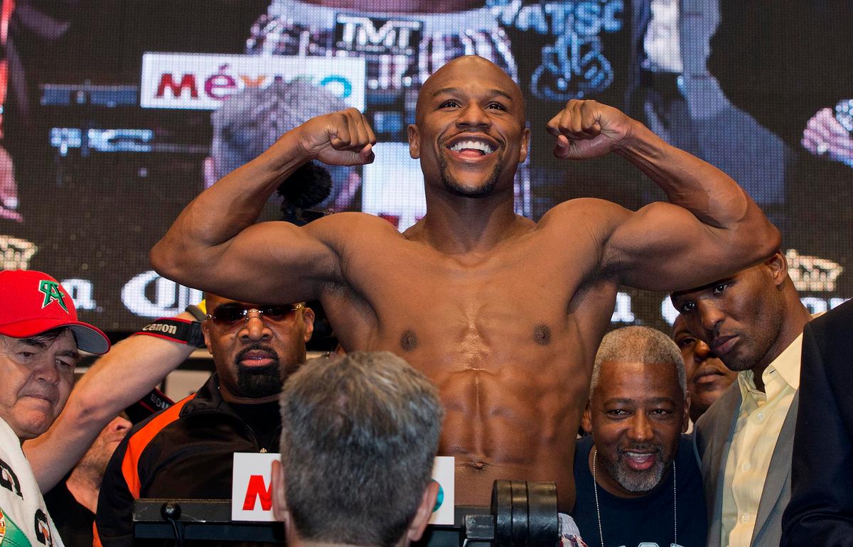 Floyd Mayweather Will Fight Amir Khan in 2015, Says Khan’s Trainer