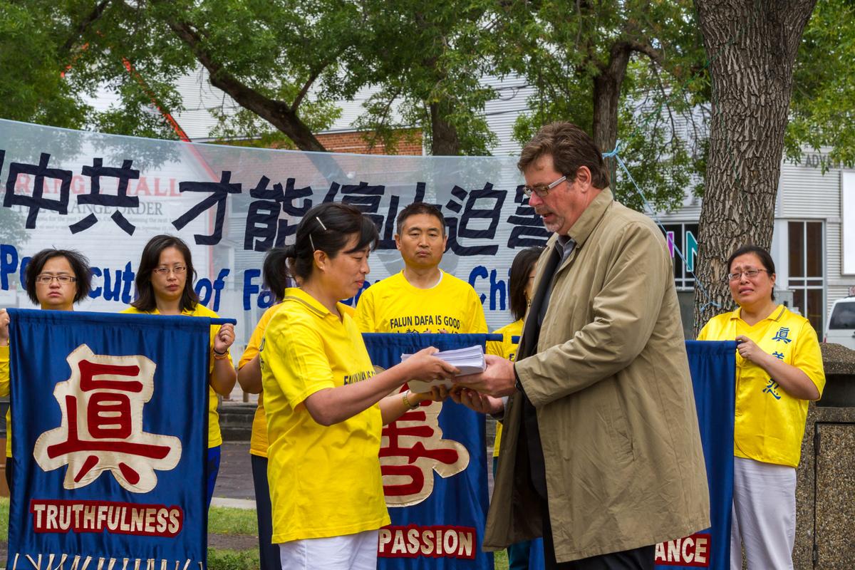 Rally in Edmonton Marks 15 Years of Brutal Persecution