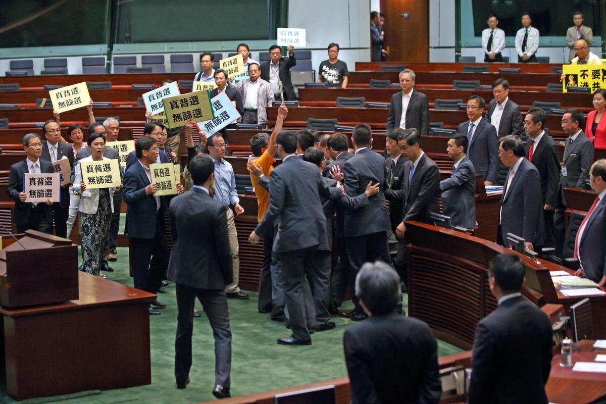 Pan-Democrats Walk Out on Hong Kong Chief Executive