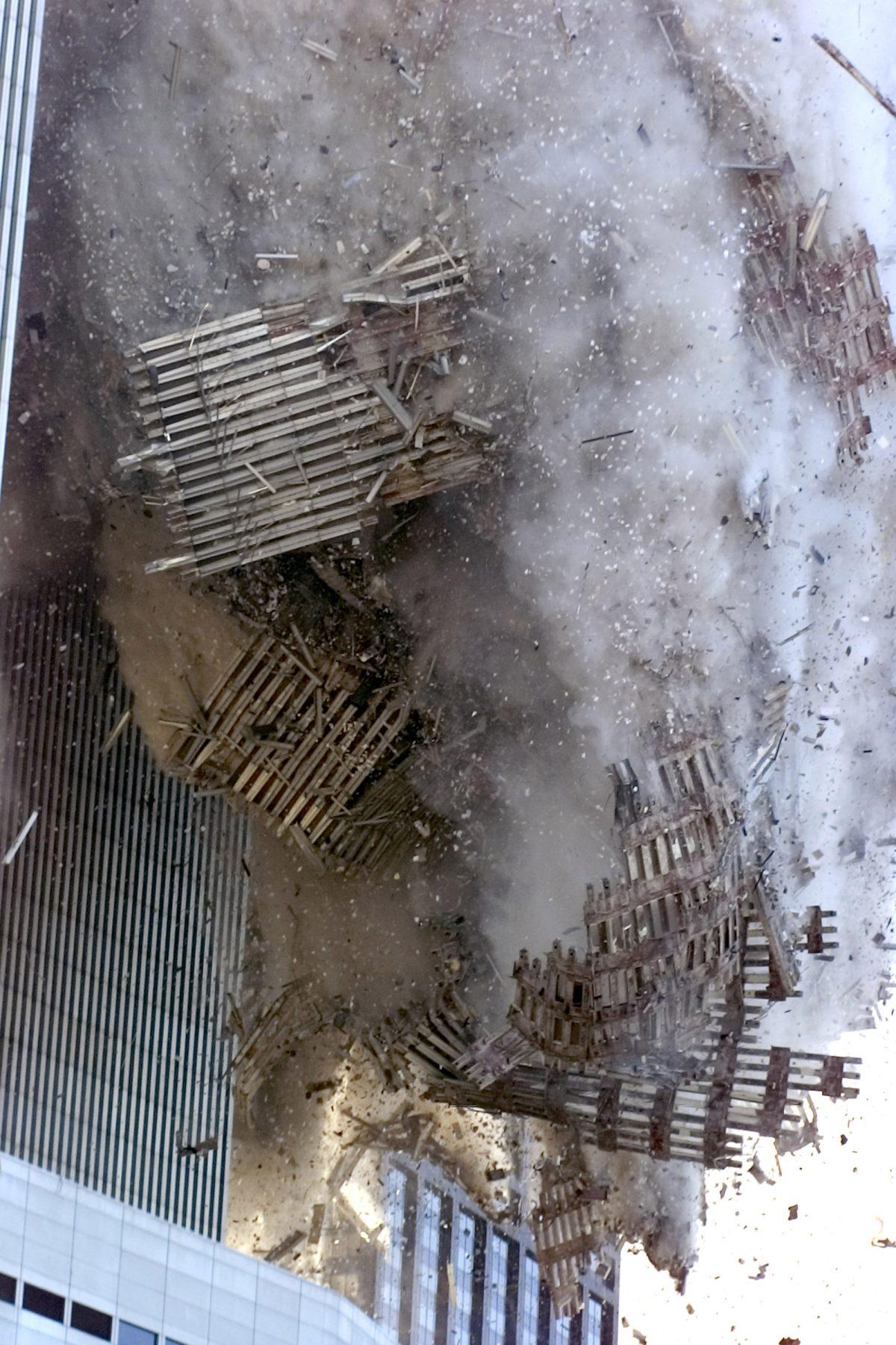 The south tower of New York's World Trade Center collapses on Sept. 11, 2001. (AP Photo/Richard Drew)