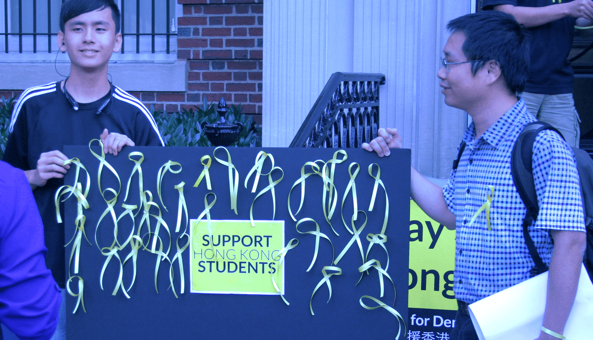 Protesters in Washington D.C. Sing Outside Hong Kong Office 