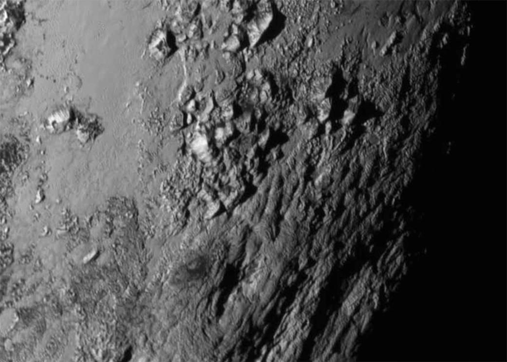 ‘Something Wonderful’: First Close-Up Pictures of Pluto