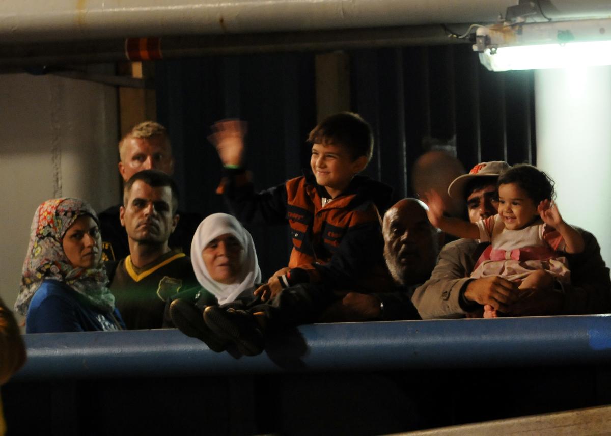 As Asylum-Seekers Flood In, Germany Struggles to House Them