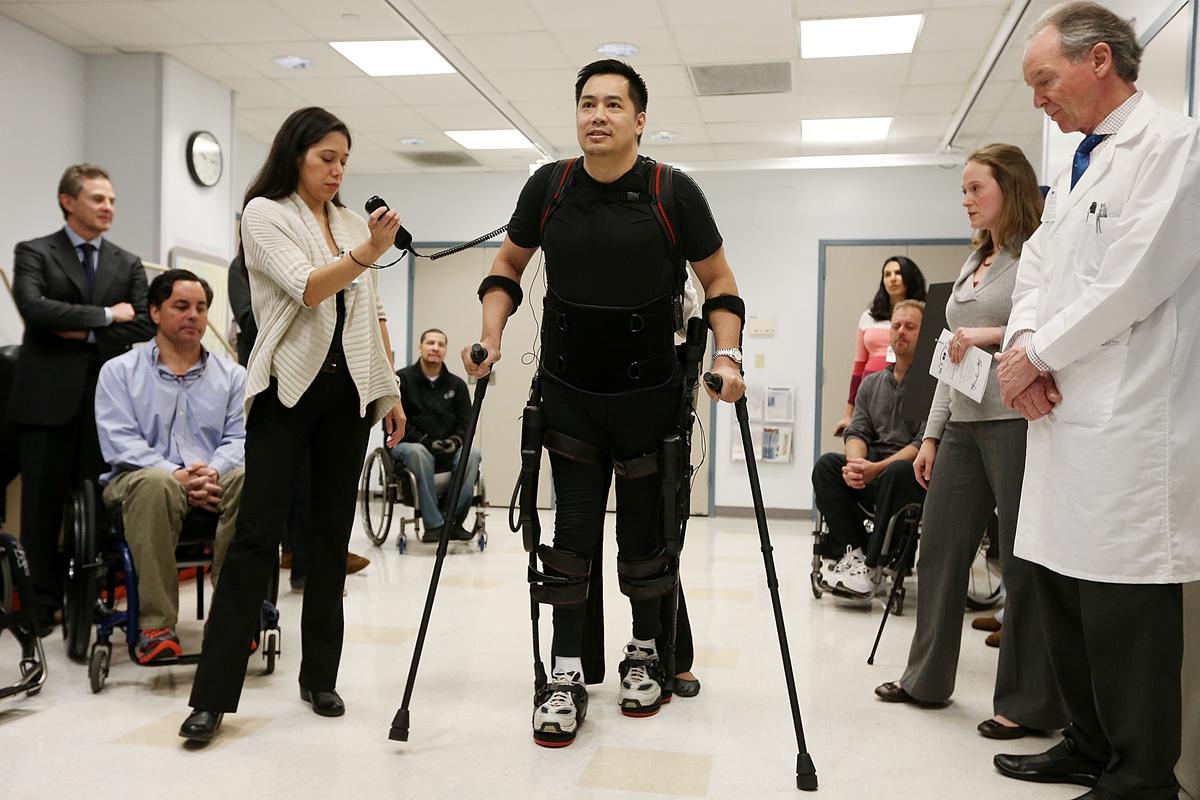 Paralyzed Man Walks With Help From Robot Exoskeleton