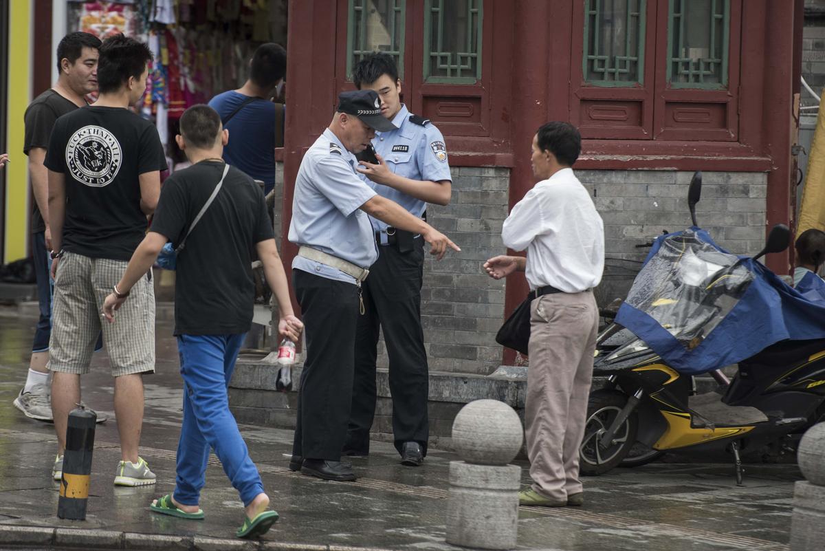 Why the Beijing Police Have Broken Up a Meeting of 80-Year-Olds