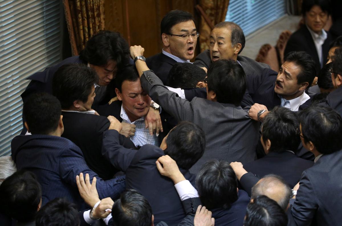 Brawl Erupts as Japan Parliament Passes Controversial Immigration Reform Bill