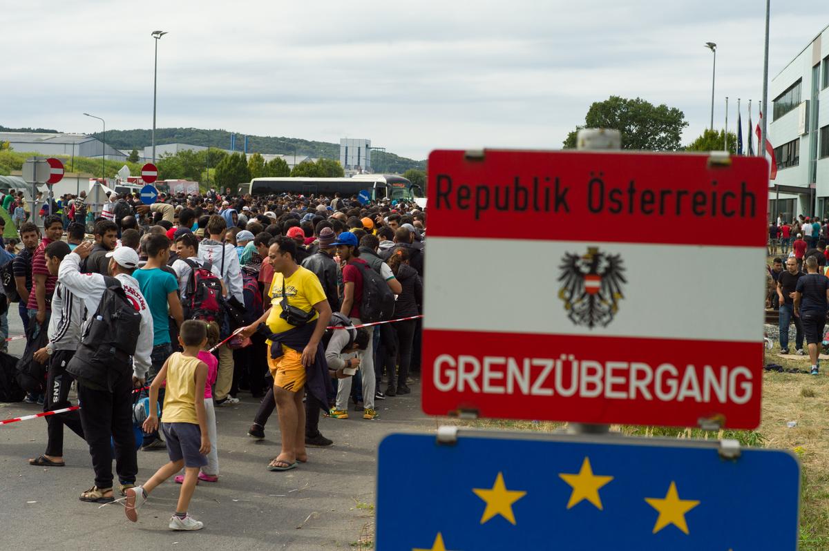 Joy as Migrants Flood Into Austria; Tears for Those Kept Out