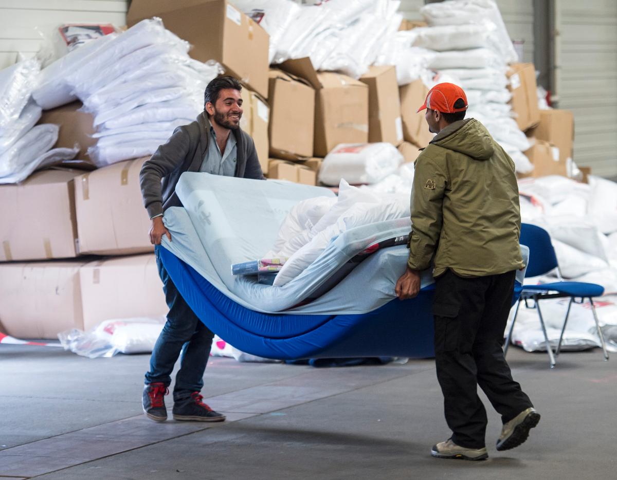 German States Lower Housing Standards Amid Migrant Influx