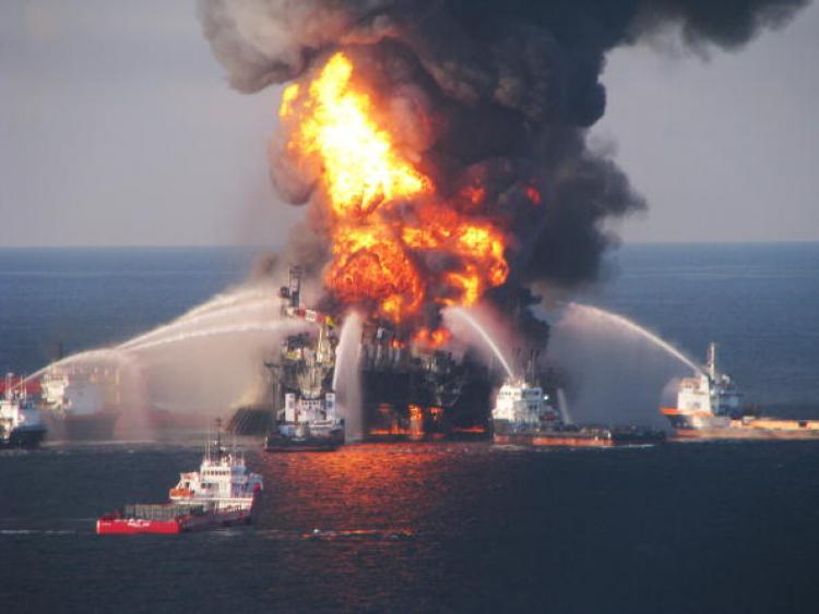 Fire boats battle a fire at the offshore oil rig Deepwater Horizon on April 21, 2010, prior to its sinking. (U.S. Coast Guard via Getty Images)