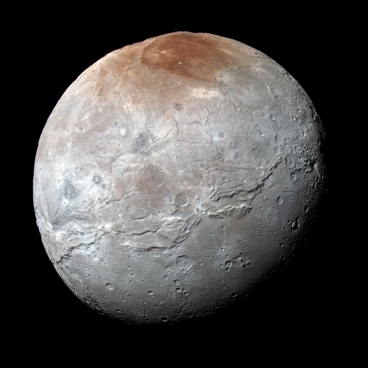 Images of Pluto’s Moon Charon Show Huge Fractures and Hints of Icy ‘Lava Flows’