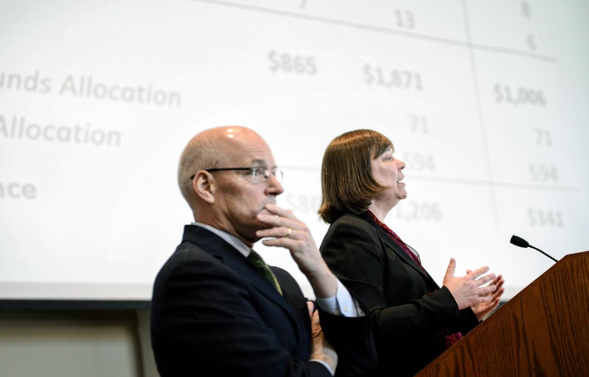 Economists Trim Forecast on Economy, but Expect Higher Pay