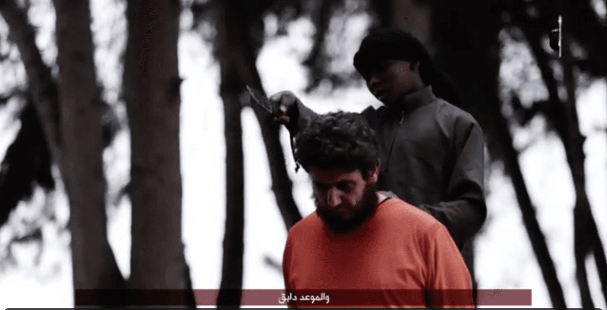 English-Speaking Child Threatens America Before Beheading a Man in New ISIS Video