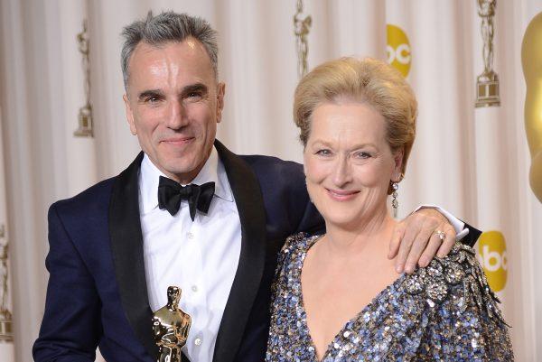 Actor Daniel Day-Lewis (L), winner of the Best Actor award for "Lincoln," and presenter Meryl Streep pose in the press room during the Oscars held at Loews Hollywood Hotel in Los Angeles on Feb. 24, 2013. (Jason Merritt/Getty Images)