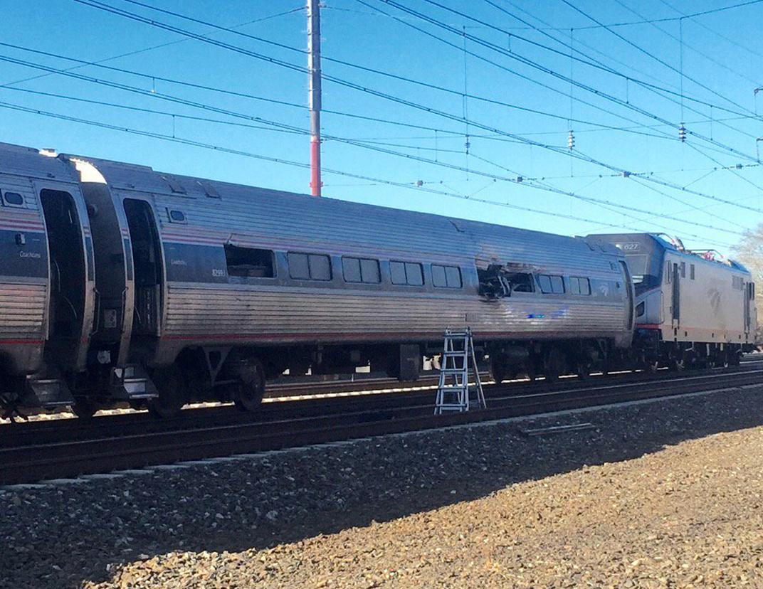 Amtrak Train Crashes Near Philadelphia, Lead Engine Derails
