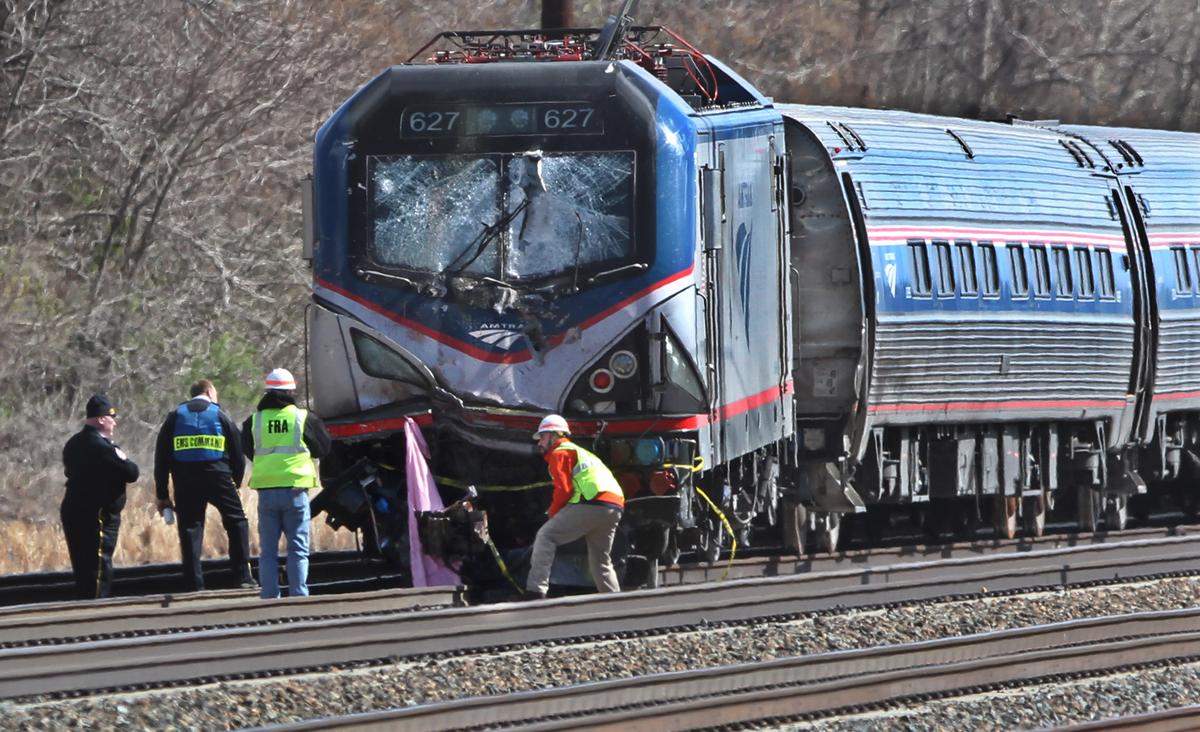 Officials: Amtrak Engineer Hit Brakes Seconds Before Crash