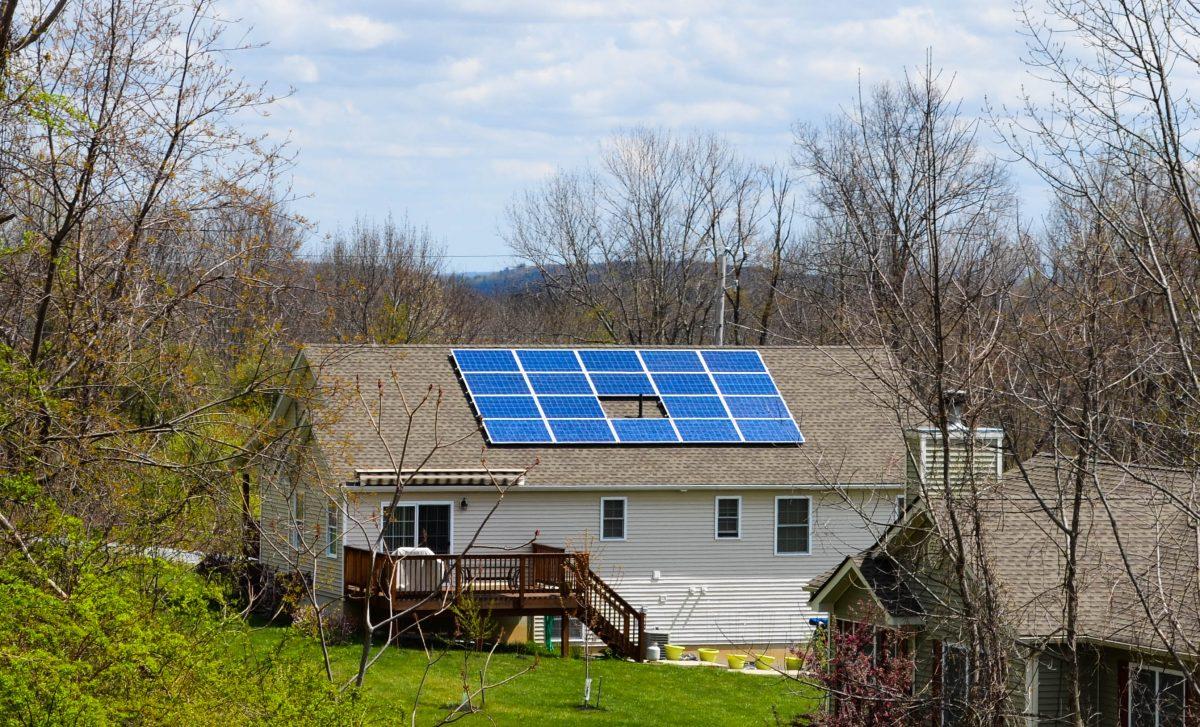 A house with rooftop solar panels in Deerpark, N.Y. (Yvonne Marcotte/The Epoch Times)