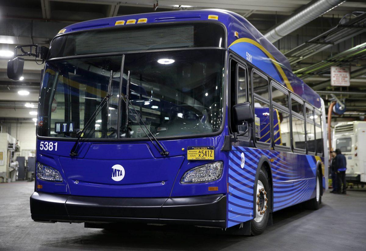 A new MTA bus is displayed during a news conference at a bus depot in New York City on May 17, 2016. (AP Photo/Seth Wenig)