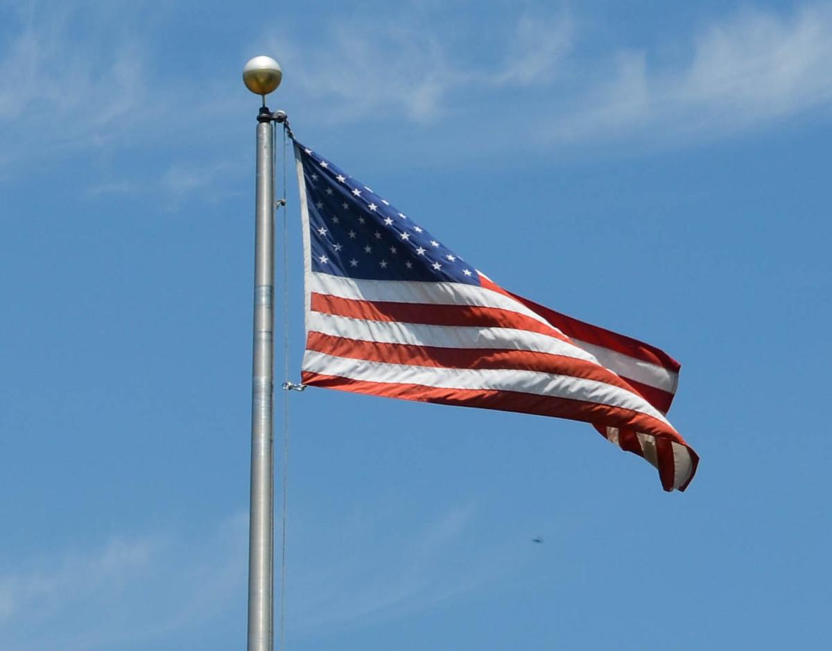 Man Charged With Removing Police Memorial Flags on Overpass