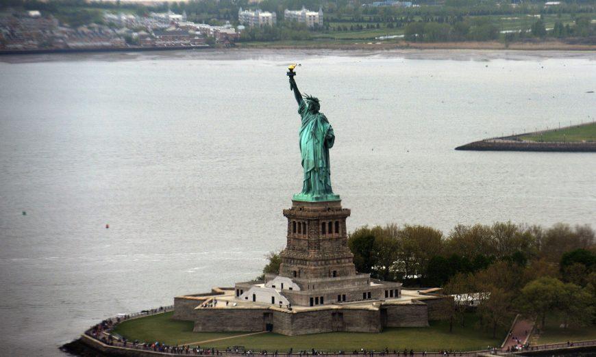 Woman Climbs Statue of Liberty on July 4 The Epoch Times