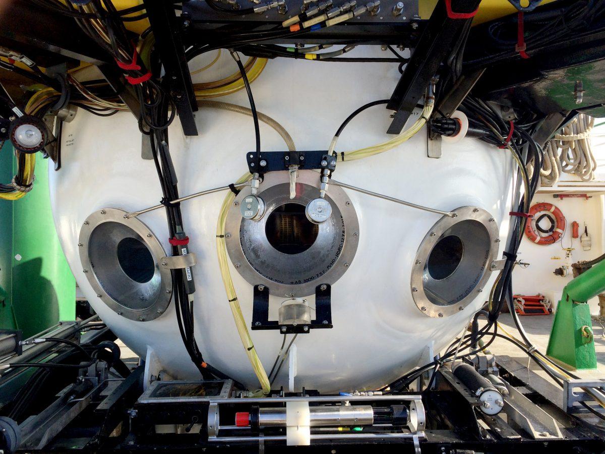 The Pisces V submersible sits on the deck of a research vessel during an expedition to previously unexplored seamounts off the coast of Hawaii's Big Island on Sept. 8, 2016. The group of undersea volcanoes known as the Geologist Seamounts are about 80 million years old and could hold many new animal species, as well as elements such as nickel and cobalt that mining companies could extract. (AP Photo/Caleb Jones)