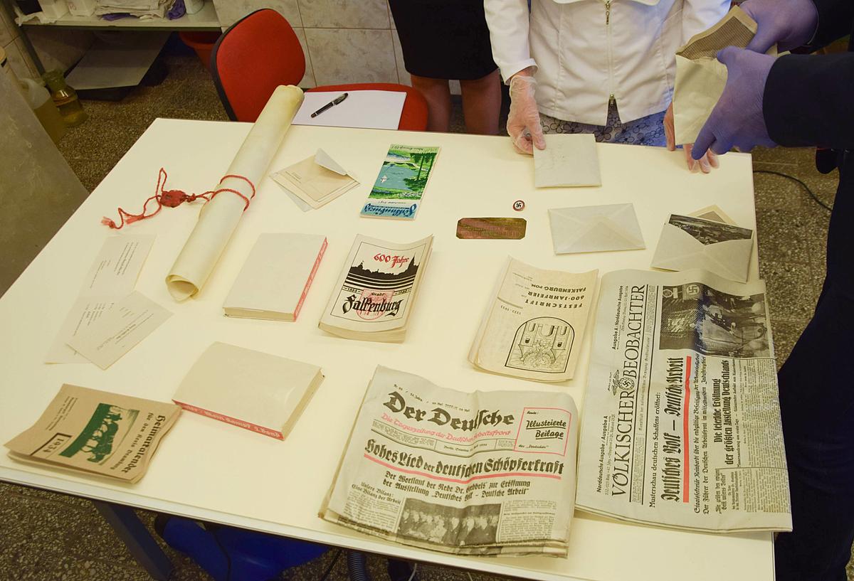 Nazi-Era Coins, Photos, Hitler’s Book Found in Poland