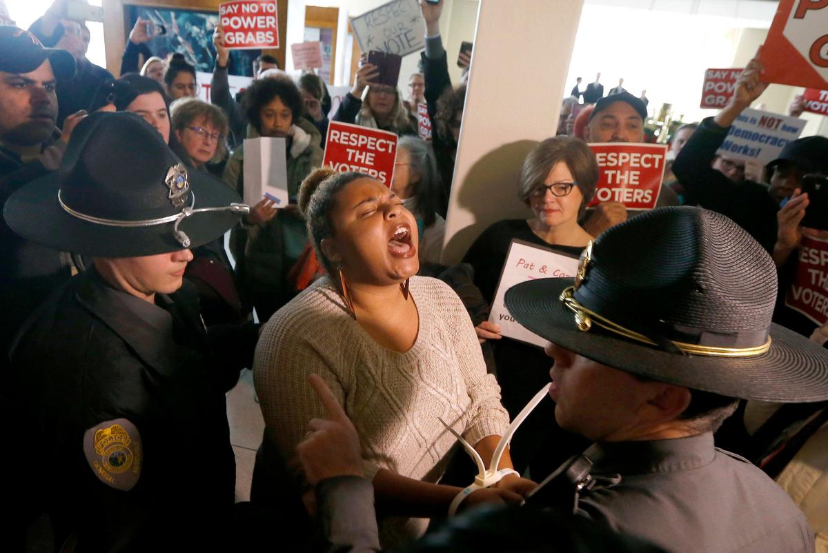 Protesters Rip GOP for Taking Away Next Governor’s ‘Power’